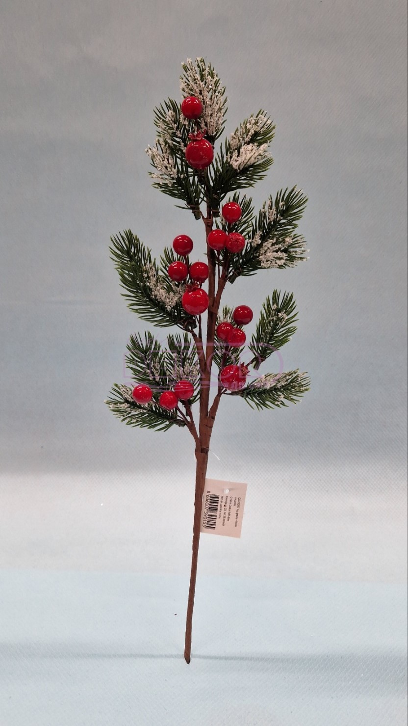 novogodišnja grana sa crvenim bobicama