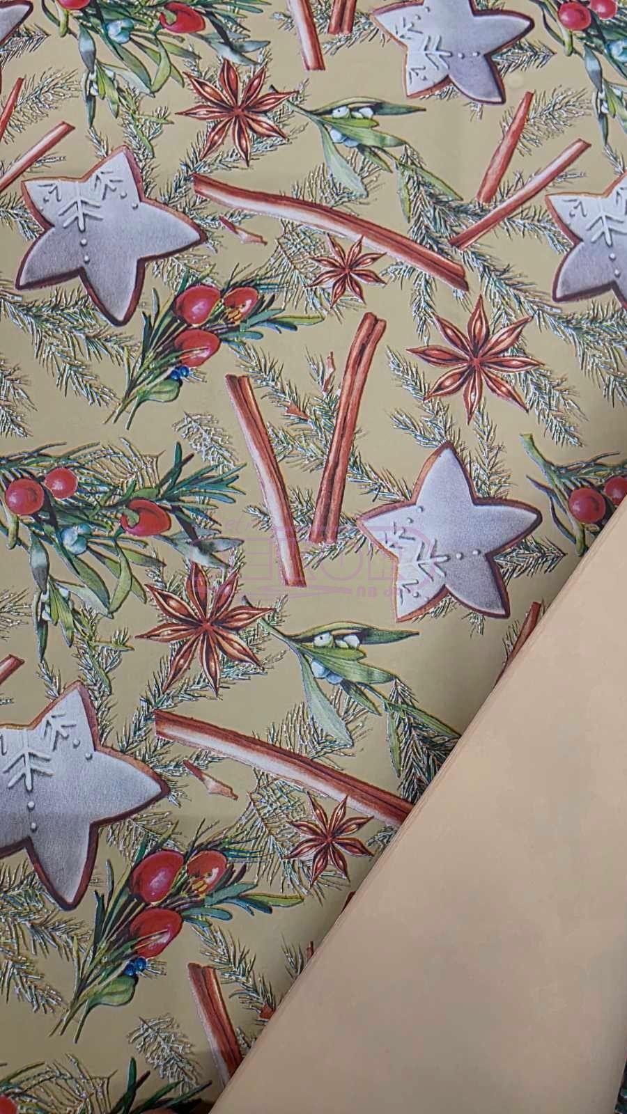 žuti ukrasni papir sa novogodišnjim elementima